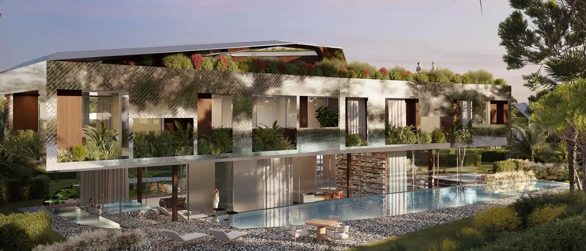 Ultra-modern exterior facade of Karl Lagerfeld Villas Marbella highlighting reflective geometric panels and an outdoor lap pool